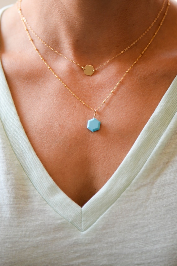 Pendant plated gold Delicate white turquoise.