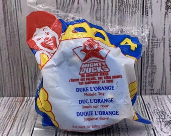 1996 McDonald's Happy Meal Spielzeug Mighty Ducks DUKE L’ORANGE Disney Fig. #4 NIP
