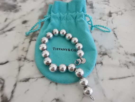 Sold at Auction: TIFFANY & CO 14MM BEAD BRACELET 8