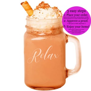 May include: A mason jar mug filled with a brown beverage topped with whipped cream and chocolate sprinkles. A straw is sticking out of the whipped cream. The mug has the word "Relax" written on it in white. A pink circle with white text says "3 easy steps: 1. Place your order. 2. Approve a proof. 3. Enjoy your items!"
