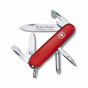 May include: A red pocket knife with a silver blade and a variety of tools. The knife has a personalized inscription that reads "Robert Smith, Groomsman | 6-19-2019".