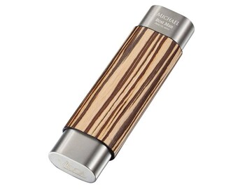 May include: A silver and wood engraved gift box with the text "MICHAEL Best Man" on the top. The box is made by the company "RECAL".