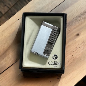 colibri cigarette case with built in lighter Vintage Black Lacquer Gold-tone & EUC Over time Vintage Colibri Enameled Cigarette Case