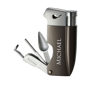 May include: A multi-tool lighter with a built-in tamper, poker, and scoop. The lighter is engraved with the name "MICHAEL".