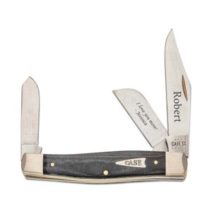 May include: A black handled Case XX pocket knife with two blades. The larger blade is engraved with "Robert" and the smaller blade is engraved with "I love you more! - Jessica".