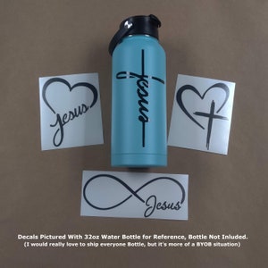 May include: Four black vinyl decals with the word "Jesus" in different styles. The decals are on a white background. The decals are pictured with a 32-ounce water bottle for reference.