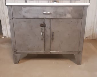Vintage industrial stripped steel medical cabinet by the Shampaine Company in St Louis