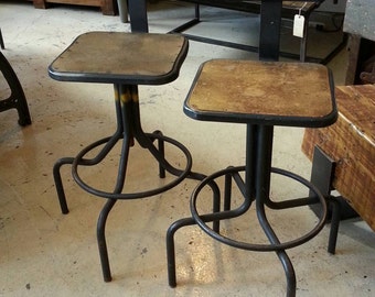 A Pair Of Vintage Industrial Stools