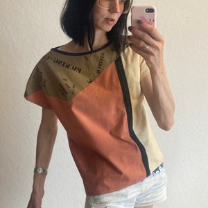 T-shirt vintage in cotone con stampa geometrica “Packing Case” nei colori della terra anni ’80