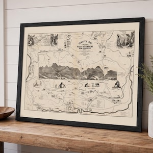May include: A framed vintage map titled Leavitt's Map of the White Mountains New Hampshire 1859, featuring detailed black ink illustrations of mountain ranges, small figures, and geographical landmarks on a cream-colored background in a black frame.
