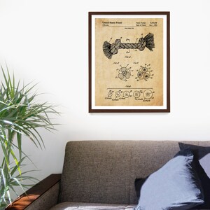 May include: A vintage patent drawing for a dog toy, a rope with a knot in the middle. The patent number is 5,115,108 and the date of patent is Jan. 5, 1992.