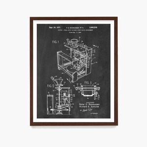 May include: Black and white illustration of a patent drawing for a pottery wheel with a variable speed drive arrangement. The patent number is 3,605,218 and the date is September 20, 1971. The inventors are Peter D. Rasmussen and Richard E. Schulze.