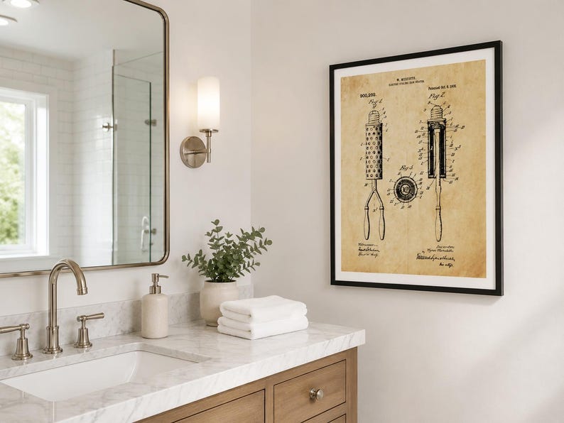 May include: A framed wall art print featuring a vintage patent illustration of a curling iron on aged, tan-coloured paper. The black ink technical drawing displays three distinct views of the device labelled Fig 1, Fig 2, and Fig 3 with text.
