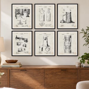 May include: A set of six framed wall art prints featuring black and white technical patent illustrations on a light beige background. Each print displays detailed diagrams of industrial equipment, including bottles, machinery, and structural components.