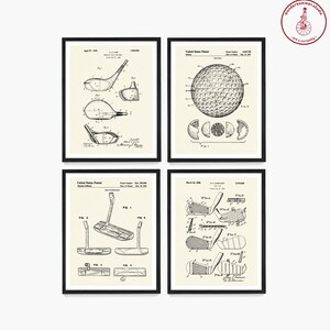 May include: Set of four vintage golf-related patent drawings. The drawings are in black and white and feature a golf ball, a golf club, and a golf putter. The drawings are framed in black frames and have a white background.