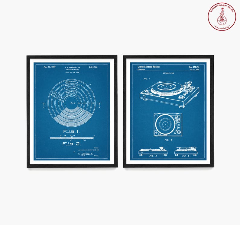 May include: Two blue and white vintage patent prints for a record player. The first print shows a diagram of a record player turntable. The second print shows a diagram of a record player with a tone arm and needle.