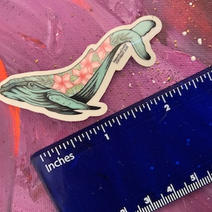 Sticker, Humpback whale and plumeria flowers with clear edges