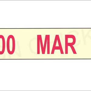 May include: A white rectangular sign with black trim and the text "FOO MAR T" in red.