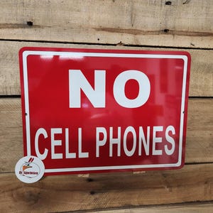 NO CELL PHONE sign, red, policy sign for store, shop, school, office