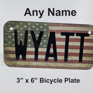 BANDERA AMERICANA - - Nombre personalizado - Matrícula de bicicleta, etiqueta de bicicleta, carrito de golf, andador, carrito de go, scooter,