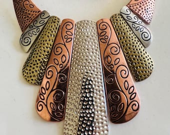 Multi metal, ethnic inspired, geometrical bib necklace
