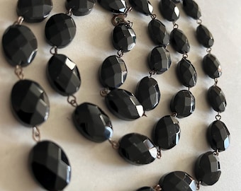 Black glass faceted beaded necklace. 32” Long