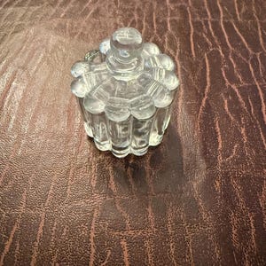 May include: A rustic wooden sign with the text "Welcome to our home" in white lettering. The sign features a distressed finish and a simple, inviting design, perfect for entryway decor.