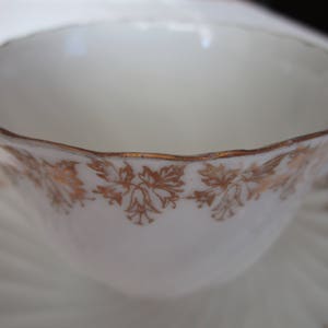 German Teacup and Saucer White with  Gold Trim German Teacup Vintage Item  Floral Design Excellent condition - Looks unused