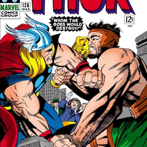 Peut inclure: Une couverture de bande dessinée mettant en scène Thor, le dieu nordique du tonnerre, vêtu d'un costume rouge et bleu, brandissant son marteau Mjolnir, en train de combattre un homme musclé à la peau brune portant un casque doré. Le texte de la couverture indique "The Mighty Thor" et "Whom the Gods Would Destroy!"