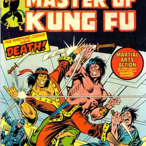 May include: A comic book cover featuring a martial arts battle scene. The cover is red, yellow, and blue with the title "Master of Kung Fu" and the text "The Hands of Shang-Chi".