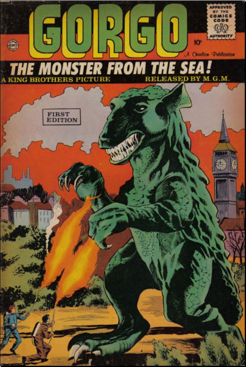 Peut inclure: Couverture de bande dessin&eacute;e intitul&eacute;e "GORGO THE MONSTER FROM THE SEA !" avec un monstre vert crachant du feu, attaquant une ville. La couverture comprend le texte "FIRST EDITION" et "A King Brothers Picture."