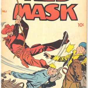 Peut inclure: Couverture de bande dessin&eacute;e vintage intitul&eacute;e "Red Mask", avec une illustration dynamique d'un personnage masqu&eacute; en rouge se balan&ccedil;ant &agrave; une corde, donnant un coup de pied &agrave; un autre personnage. D'autres personnages et chevaux sont &eacute;galement repr&eacute;sent&eacute;s.