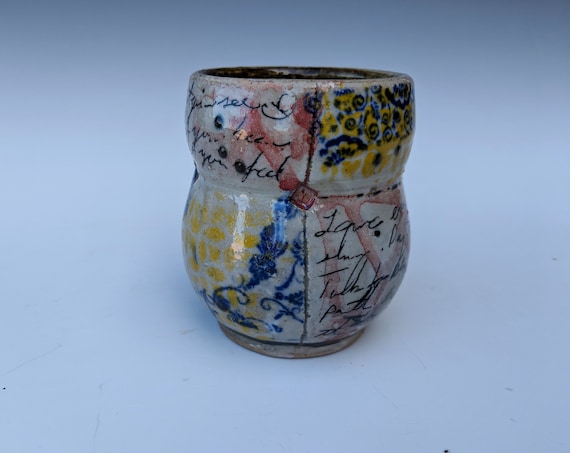 Handmade ceramic cup, with written word