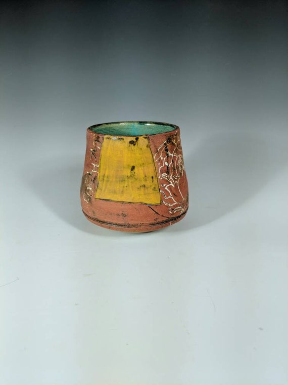 Handmade ceramic wobbly sipper