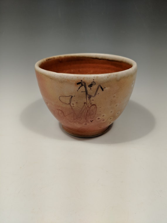 Handmade porcelain woodfire bowl, tea bowl, with tryke decal