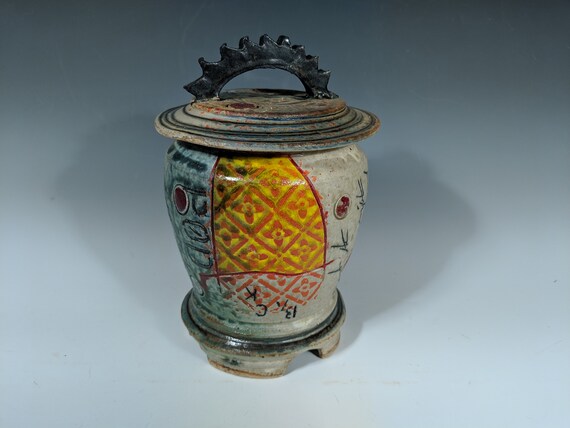 Handmade Ceramic Lidded Gear Top Jar, with Orange and Yellow Pattern with Red Dots