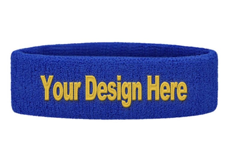 Puede incluir: Cinta para la cabeza de rizo azul con el texto bordado "Your Design Here" en amarillo. La cinta es de color liso y parece nueva.