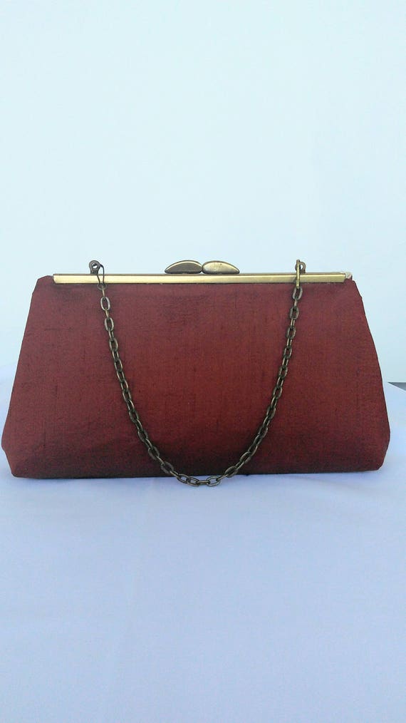 burnt orange clutch