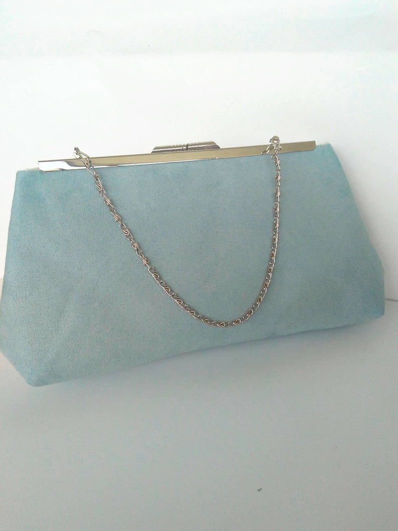 light blue suede clutch bag