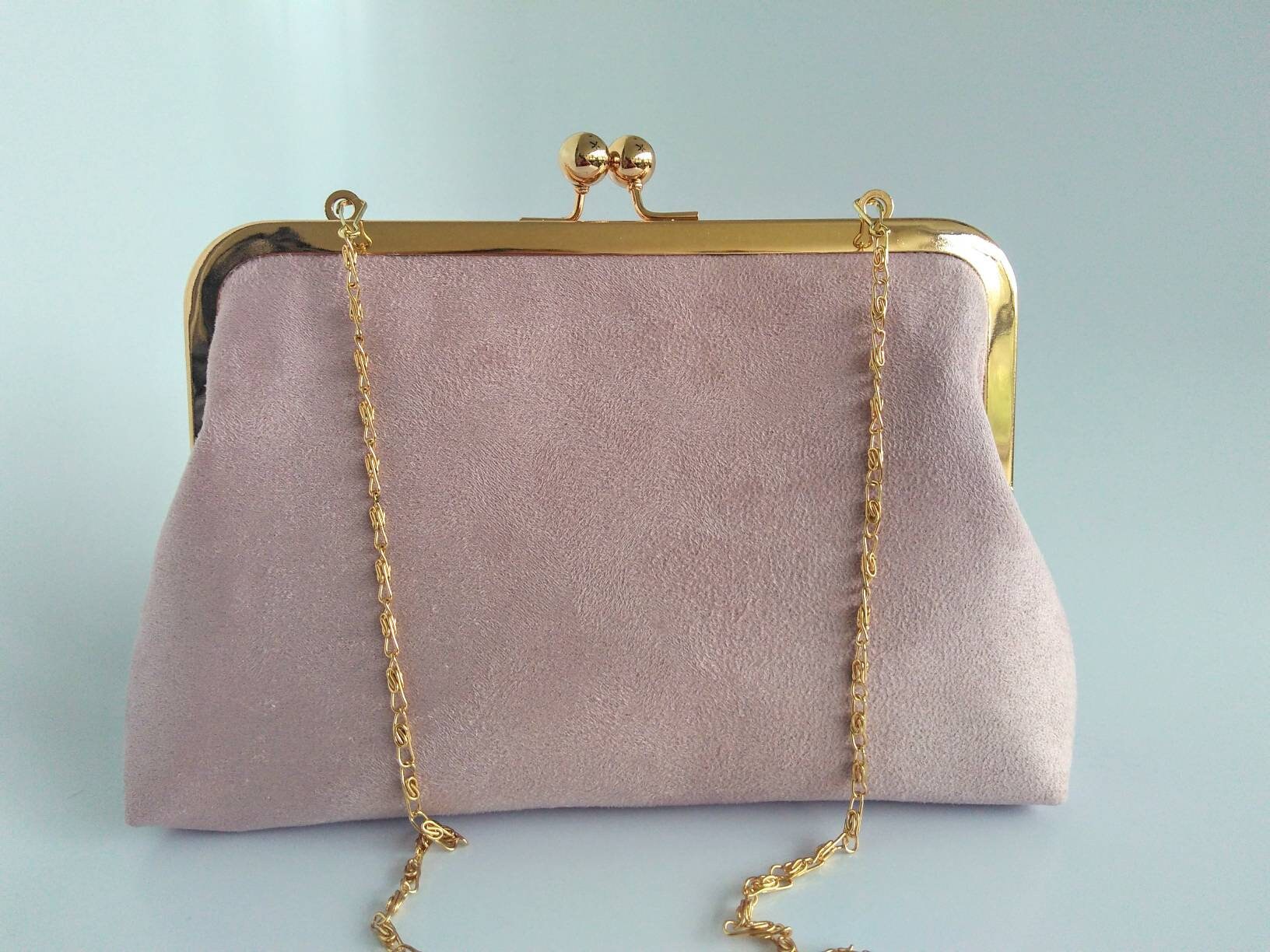 blush suede clutch