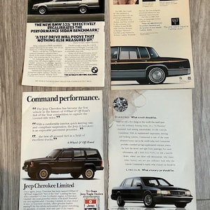 May include: A collection of vintage magazine advertisements featuring automobiles. The ads showcase a silver BMW 535i, a black Cadillac, a black Jeep Cherokee, and a black Lincoln. Each ad includes text and imagery promoting the vehicles.