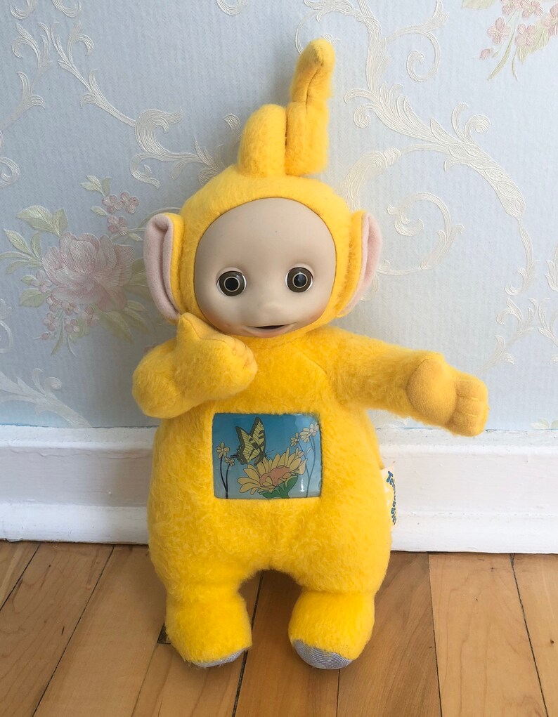 yellow teletubby toy