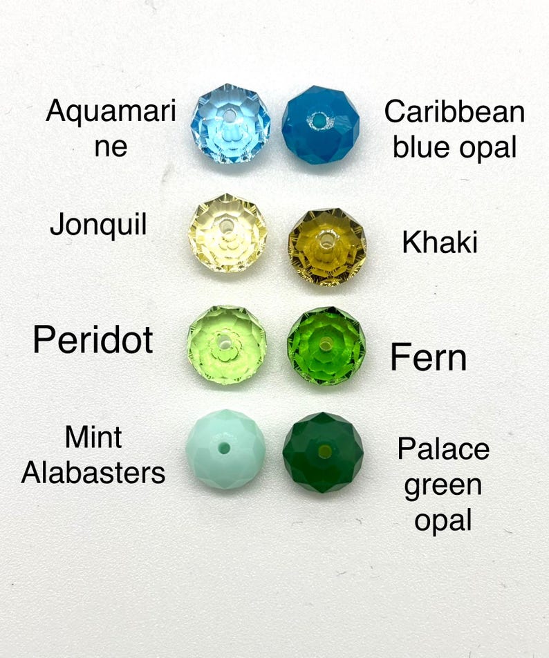 May include: Assortment of 10 faceted glass beads in various colors, including aquamarine, Caribbean blue opal, jonquil, khaki, peridot, fern, mint alabasters, and palace green opal.