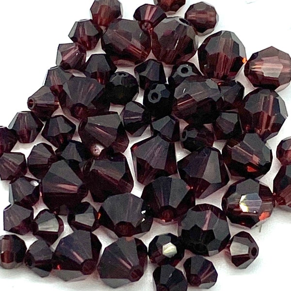 4 or 6 mm Burgundy. Bicone #5301/5328 or Round #5000 Genuine Swarovski Crystal Beads