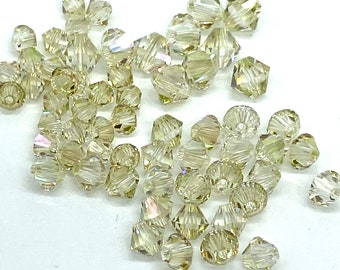 3,4,5 or 6 mm Crystal Luminous Green. #5328 Genuine Swarovski Crystal Bicone Beads