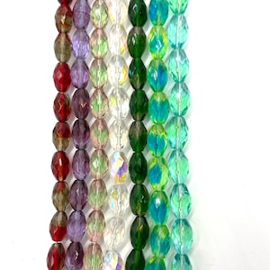 10 x 15 mm Faceted Oval Fire polished Czech Glass. 12 beads per Strand.