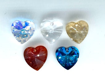 May include: Five heart-shaped crystal pendants in various colors, including clear, iridescent, light brown, red, and blue.