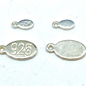 Quality tag /charm with .925 stamped. Free shipping.