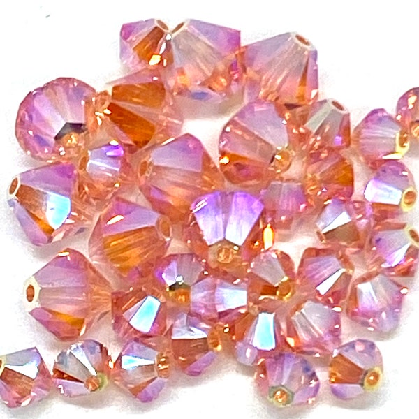 4 or 6 mm  ROSE PEACH AB 2X . Genuine Swarovski Crystal Beads #5301/5328.