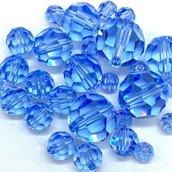 4,5,6,8,10 mm Light Sapphire. #5000 Round Genuine Swarovski Crystal Beads. Choose size and Quantity.